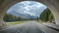 Looking through a tunnel at a mountain range in Banff Natiaonal Park in Canada Royalty Free Stock Photo