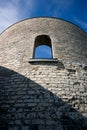 Looking up at Ancient Stone Tower Wall