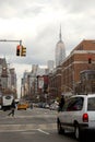 Looking up Avenue of the Americas from Greenwich Village, Empire State Building in distance,