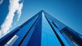 Looking Up Blue Modern Office Building..The striking blue modern office building, nestled amid the bustling cityscape