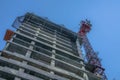 Looking up at a building under construction with clear blue sky background Royalty Free Stock Photo