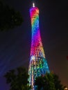 Looking up at the colorful Canton Tower at night