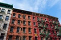 Colorful Old Buildings in Chinatown New York City with Fire Escapes Royalty Free Stock Photo