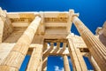 Looking up at a columns of Propylaea gateway in Acropolis of Athens, Greece Royalty Free Stock Photo