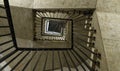 Looking up from a dark stairwell