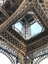 Looking up through the Eiffel Tower