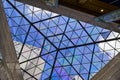 Looking up at a glass atrium inside the lobby of a hotel in the Heart of Miami, Florida, USA