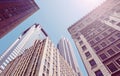 Looking up at Manhattan skyscrapers, color toned picture, New York City, USA