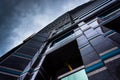 Looking up at a modern building under a cloudy sky in Philadelphia, Pennsylvania. Royalty Free Stock Photo