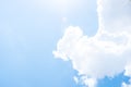 Looking up at Nice blue sky with sun beam behind big cloud Royalty Free Stock Photo