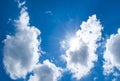 Looking up at Nice blue sky with sun beam behind big cloud Royalty Free Stock Photo