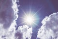 Looking up at Nice blue sky with sun beam and halo with cloudy,Vintage filter Royalty Free Stock Photo