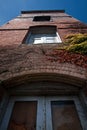 Looking up at old brick building Royalty Free Stock Photo