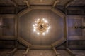 Looking up at old church ceiling. Chandelier light and classic i Royalty Free Stock Photo