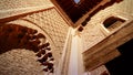 Looking up at the old Koranic School decorations in Marrakech in the late afternoon