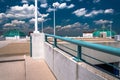 Looking up a parking garage ramp, under a blue summer sky in Tow Royalty Free Stock Photo