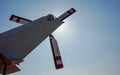 Looking up red and white rear helicopter rotor, bright sun background Royalty Free Stock Photo