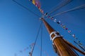 Looking up a ship mast with signal flags.. Royalty Free Stock Photo