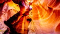 Looking up at the smooth curved Red Navajo Sandstone walls of the Upper Antelope Canyon Royalty Free Stock Photo