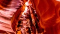 Looking up at the smooth curved Red Navajo Sandstone walls of the Upper Antelope Canyon Royalty Free Stock Photo