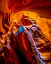 Looking up at the smooth curved Red Navajo Sandstone walls of the Upper Antelope Canyon