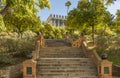 Looking up some steps towards a castle and orange trees Royalty Free Stock Photo