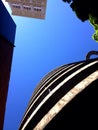 Looking Up at Spiral Parking Garage Ramp and Building and Tree Royalty Free Stock Photo