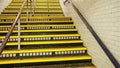 Looking up the stairs with green arrow and red X symbol showing people which side they should walk on Royalty Free Stock Photo