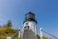 Owls Head Lighthouse on a clear sunny summer day with blue sky