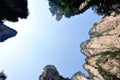 Looking up of steep stone mountain at zhangjiajie