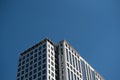 Looking up at a tall building top, with blank empty room space at top for copy Royalty Free Stock Photo