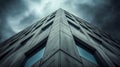 Looking up at a tall concrete building under cloudy sky Royalty Free Stock Photo