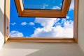 Looking up to the blue cloudy sky through modern square window. Selective blue sky Royalty Free Stock Photo