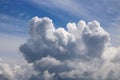 Dramatic cumulonimbus cloud on sunny day