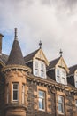 Looking up to the rooftop windows of a typical old building in t Royalty Free Stock Photo