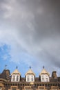 Looking up to the rooftop windows of a typical old building in t Royalty Free Stock Photo