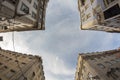 Looking up at typical Lisbon houses against blue sky