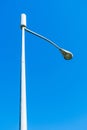 Looking up on a typical small cell antenna for 5G wireless network installed on a street light pole