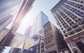 Looking up view at Manhattan buildings, color toned picture, New York City, USA Royalty Free Stock Photo