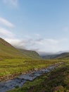 Looking up the Water of Saughs at the start of Glen Lethnot high up in the Angus Glens