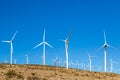 A Wind Farm in California, beneath a clear blue sky Royalty Free Stock Photo