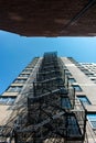 Looking Upwards at a Fire Escape in a tight Alley in Chicago Royalty Free Stock Photo