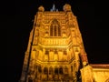 Illuminate church tower captured against the night sky Royalty Free Stock Photo