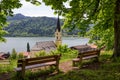 Lookout point above schliersee village with wooden benches