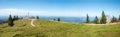 Lookout point Kampenwand, hiking area chiemgau with mountain cross and view to lake Chiemsee Royalty Free Stock Photo
