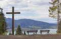 Lookout point with wooden cross and benches, lake tegernsee