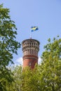 Lookout tower with Swedish flag on top Royalty Free Stock Photo
