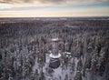 Lookout tower in winter landscape