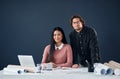 It looks easy when you put in the hard work. Portrait of two young architects working together in their office. Royalty Free Stock Photo