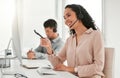 Looks like we have that for you. a young female call center agent using a computer at work. Royalty Free Stock Photo